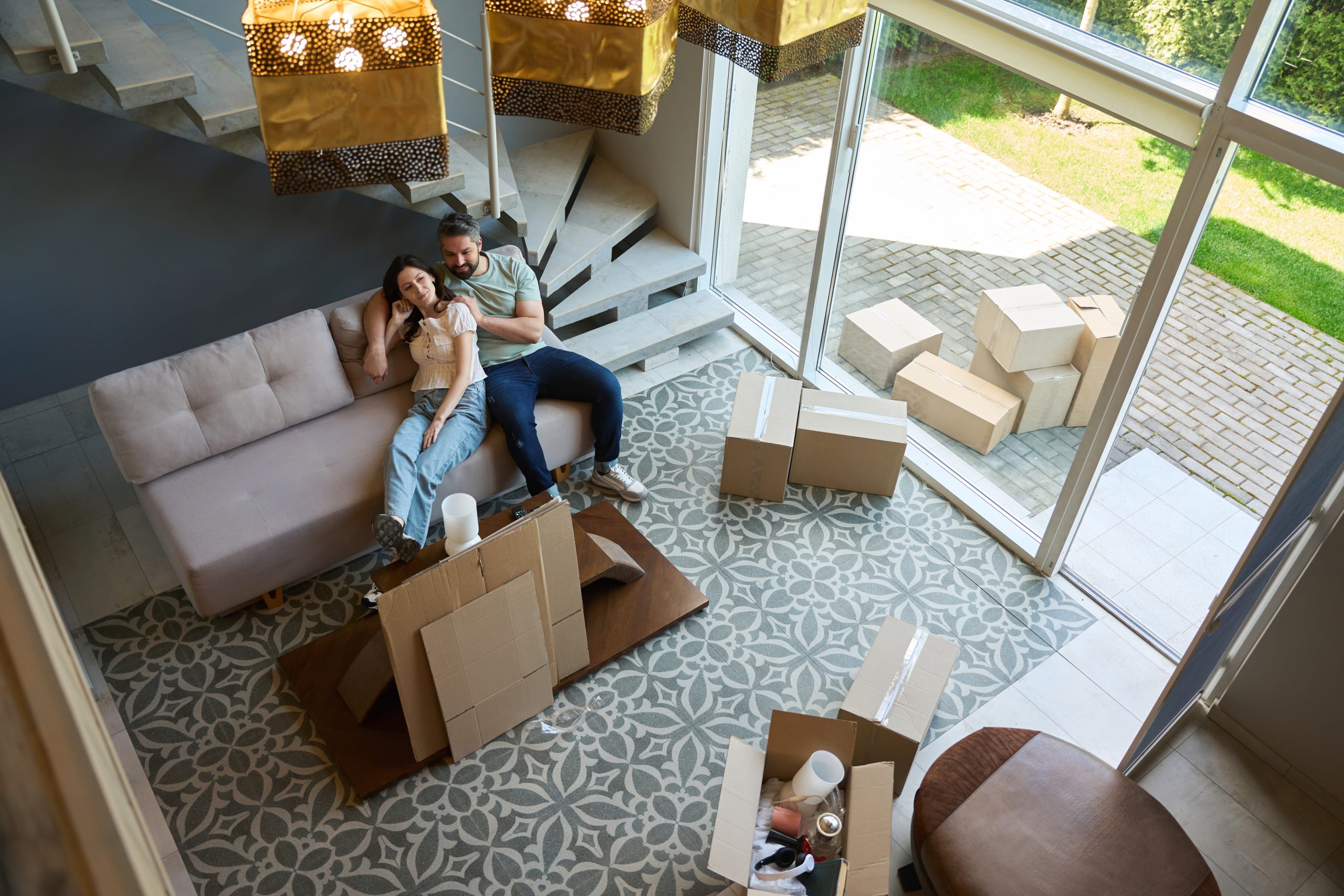 Beautiful couple having good time in modern room