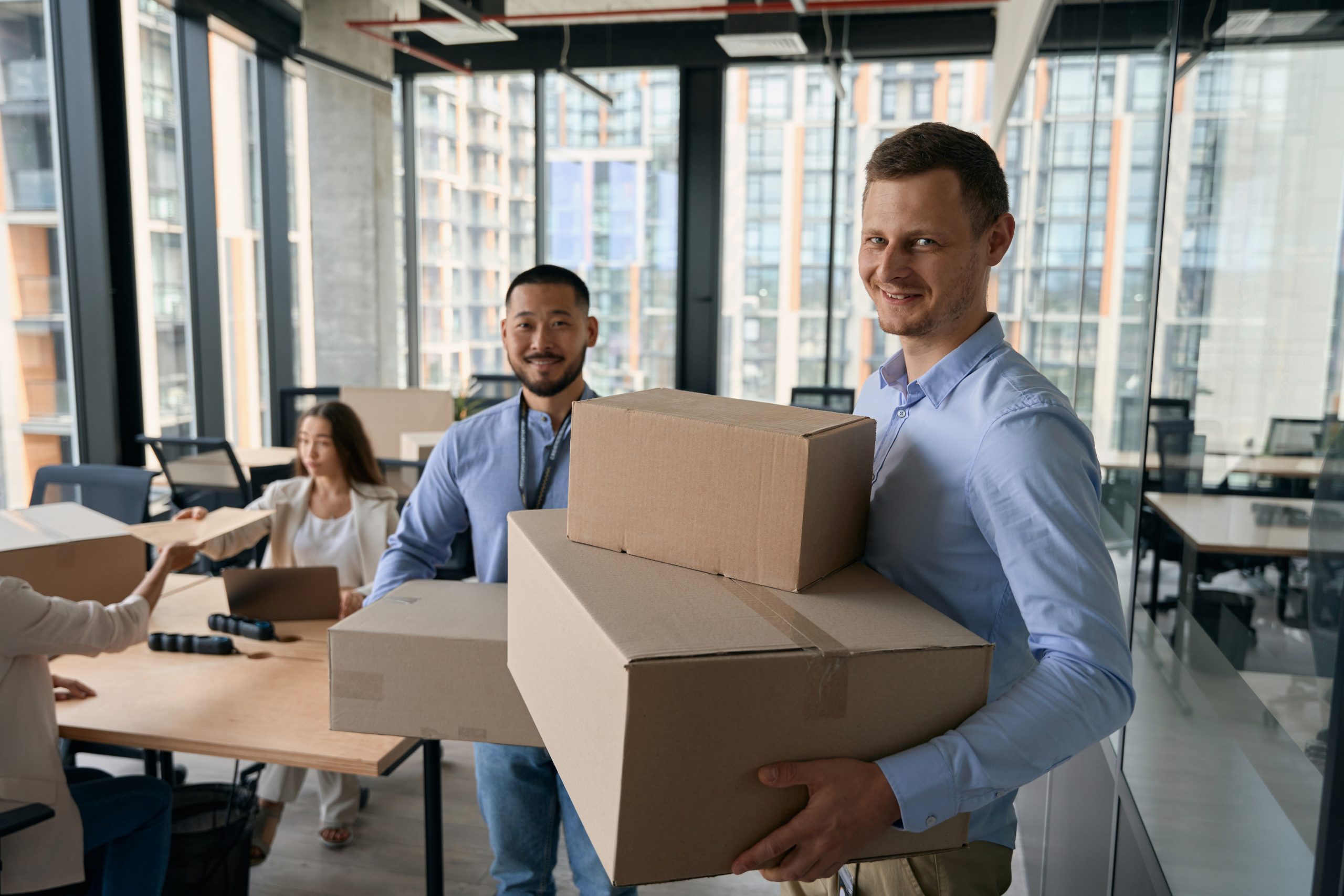 Young company staff involved in office relocation
